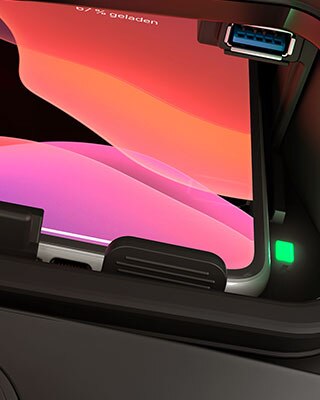 We see the storage compartment for the smartphone with wireless induction charging.
