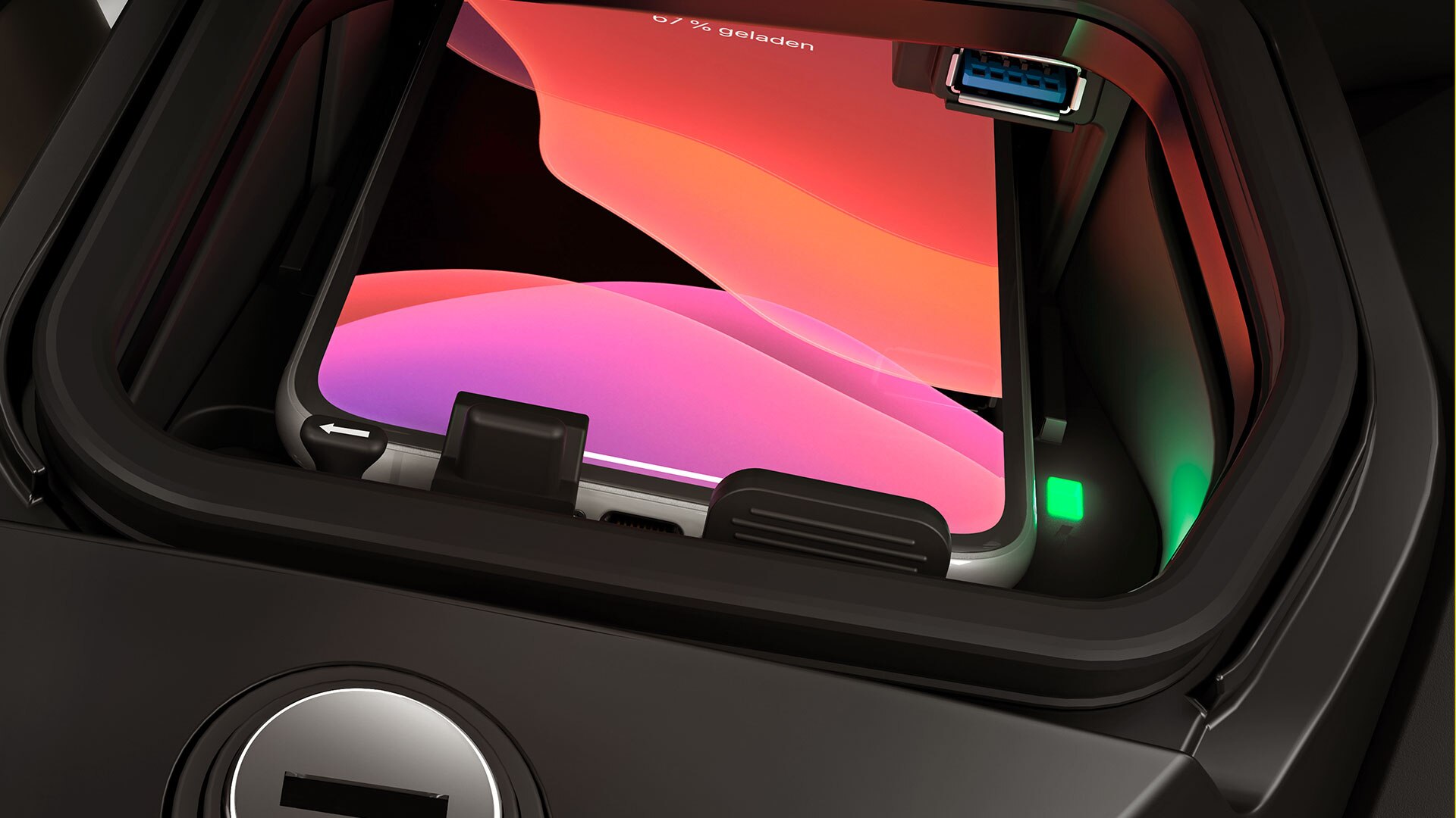We see the storage compartment for the smartphone with wireless induction charging.